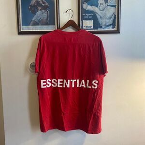Fear of God Essentials red t-shirt size small released in 2018